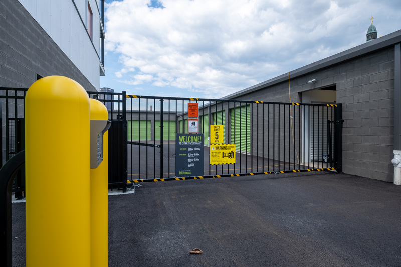 An view of the gated entrance to the Carson St. ExtraSpace Storage facility located in Pittsburgh, PA